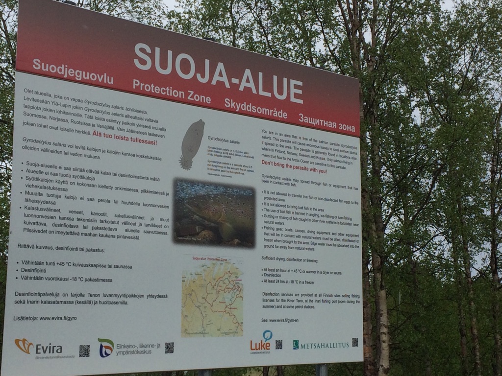 Roadside signs remind tourists of G salaris protection zone in Northern Lapland.